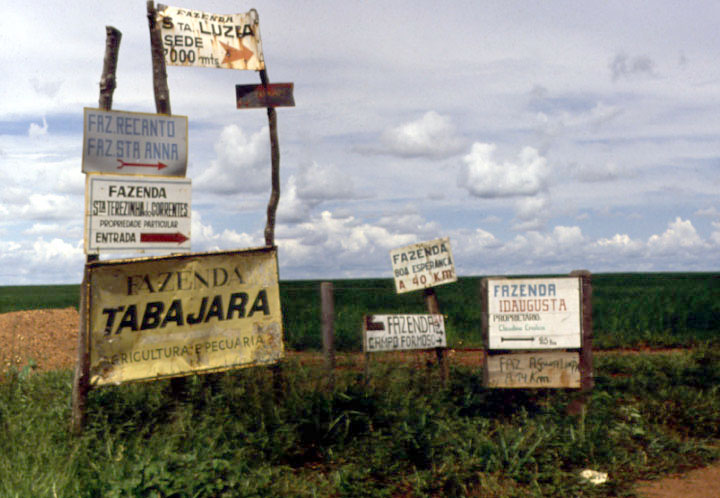 Signs indicating farms along BR-163 in Mato Grosso