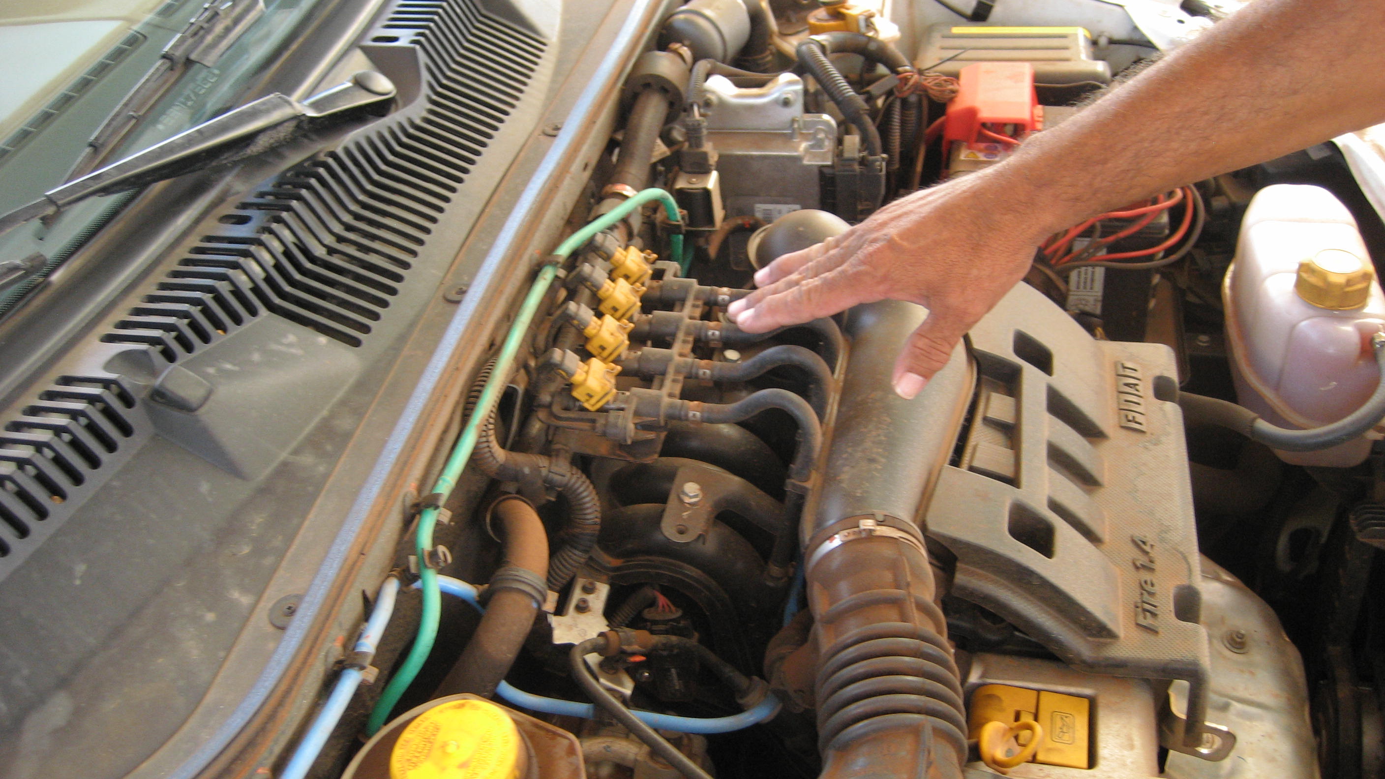 Tri-flex Fiat taxi that can use natural gas, alcohol, or gasoline