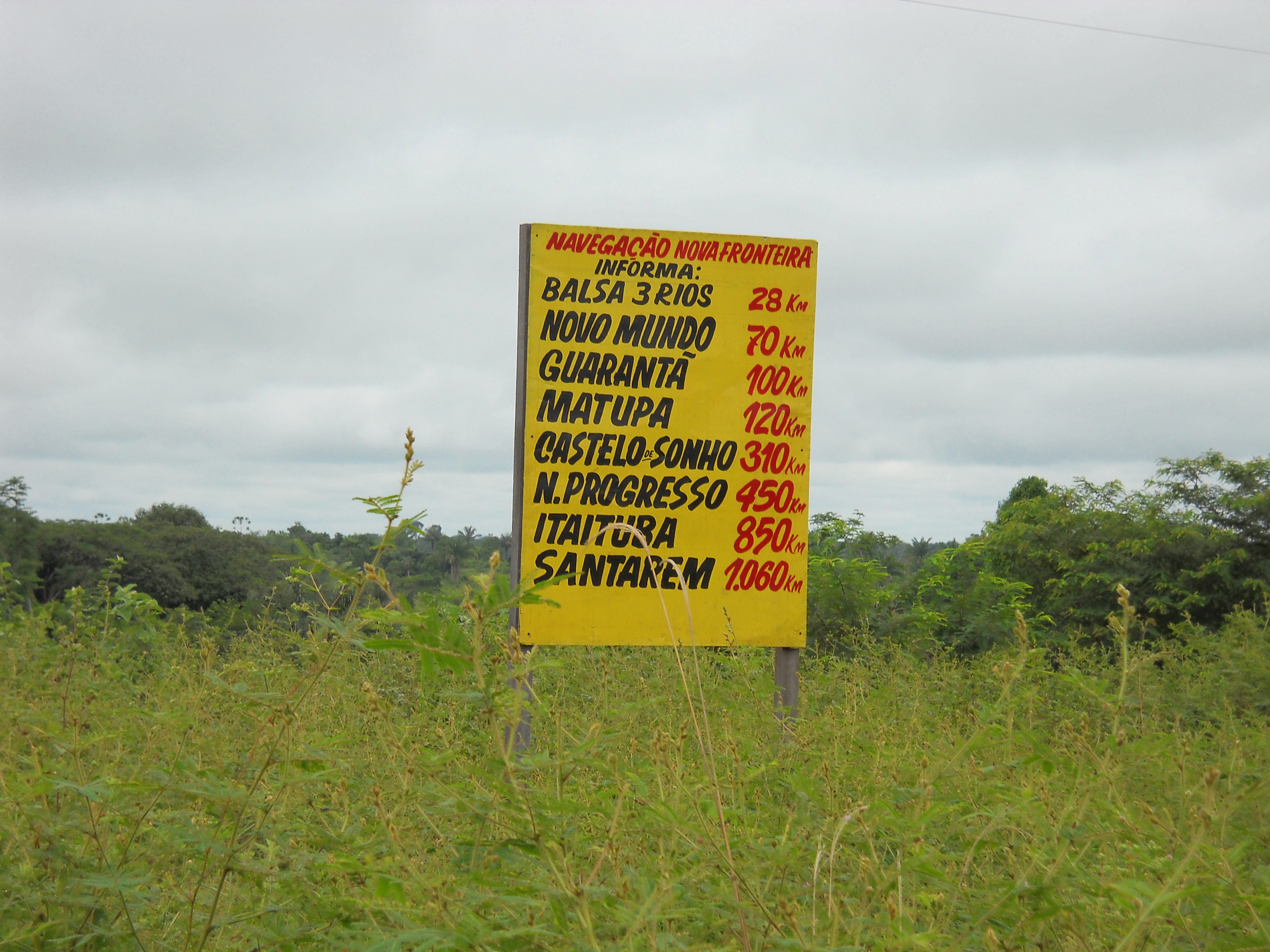 Road sign near Alta Floresta in far northern Mato Grosso, distance in kilometers