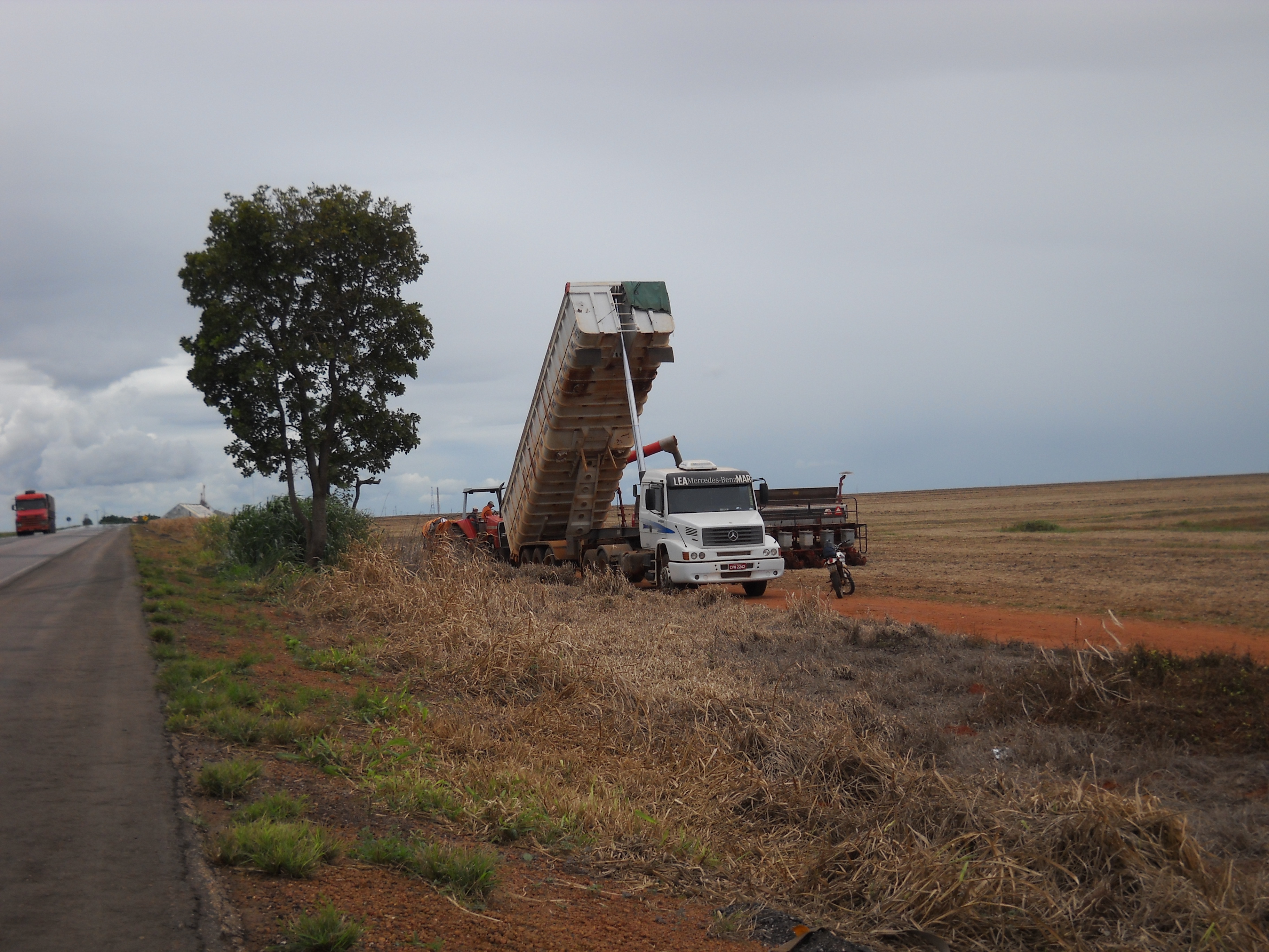 Filling planter with safrinha corn seed near Itiquira in far southern Mato Grosso