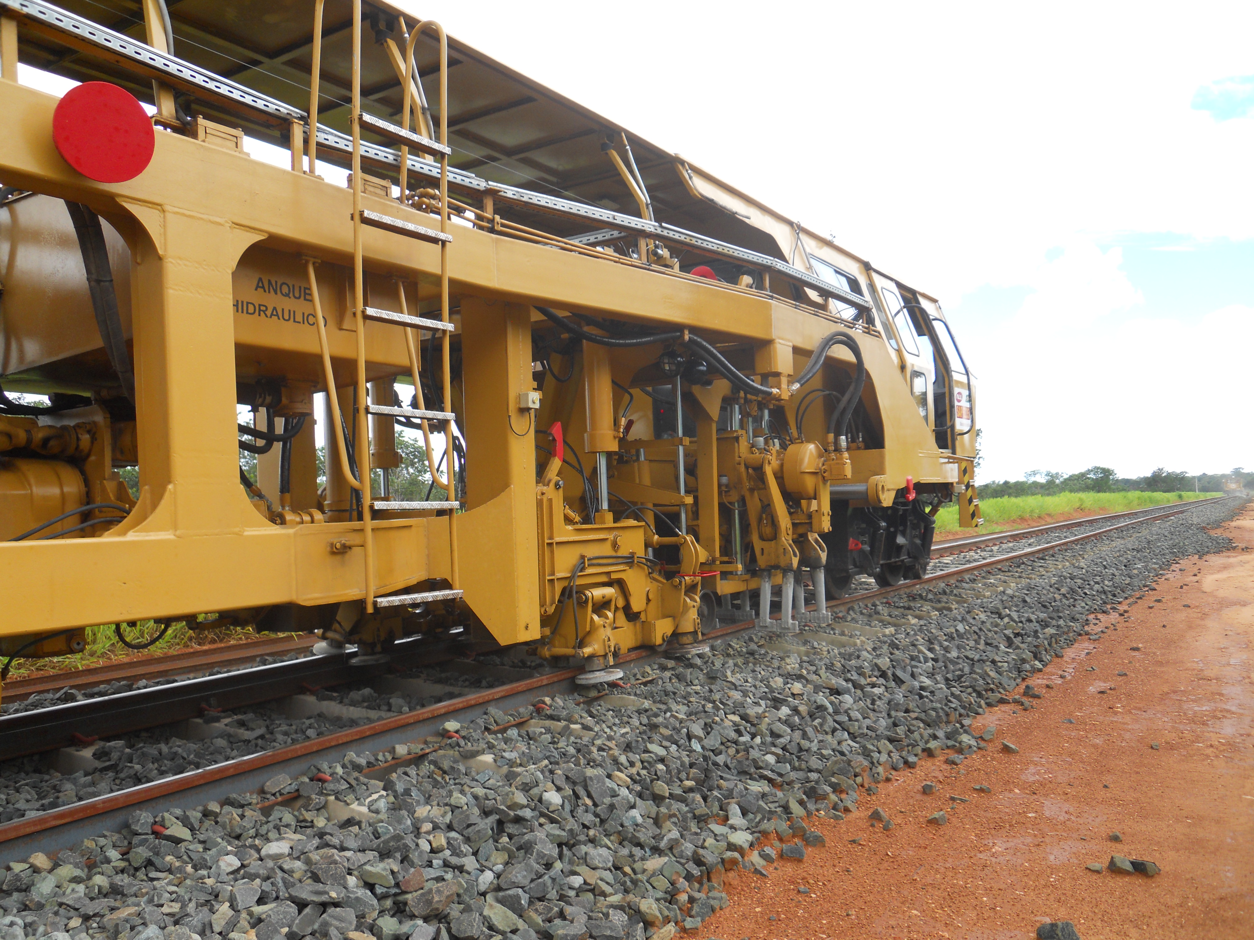 Aligning and leveling new track on Ferronorte Railroad near Alta Araguaia in southeastern Mato Grosso, Brazil