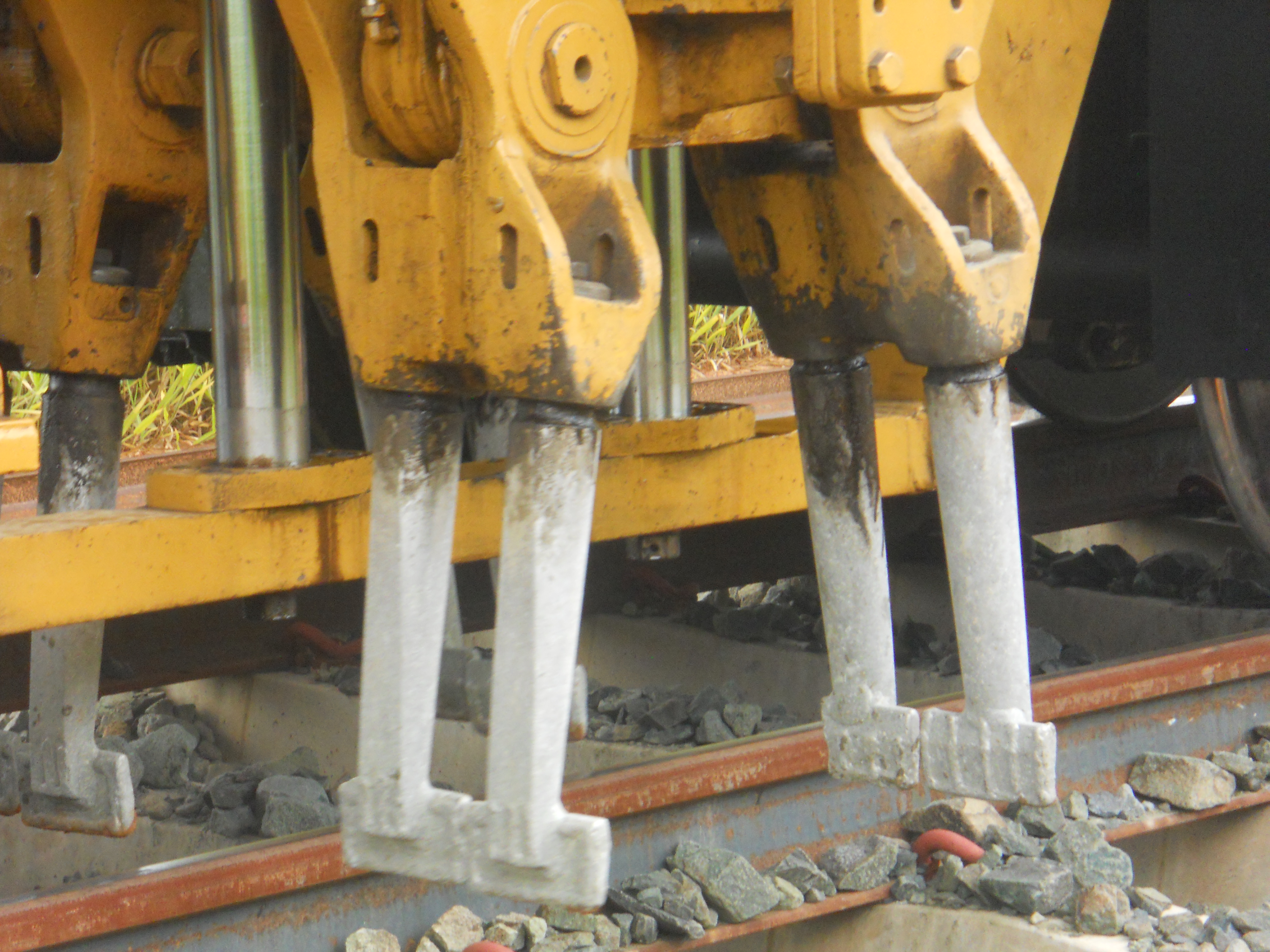 Aligning and leveling new track on Ferronorte Railroad near Alta Araguaia in southeastern Mato Grosso, Brazil