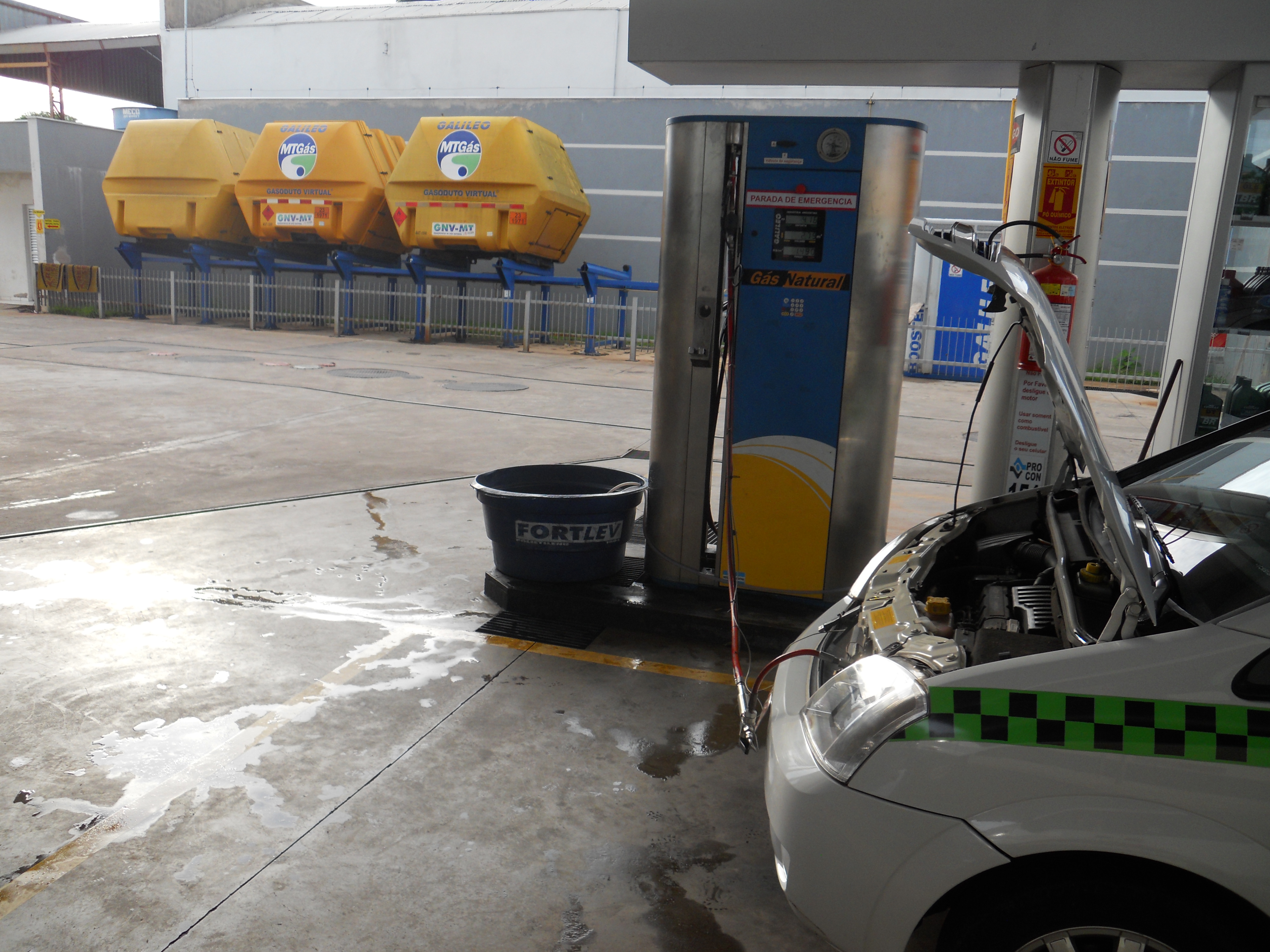 Filling taxi with natural gas in Cuiaba, Mato Grosso, Brazil