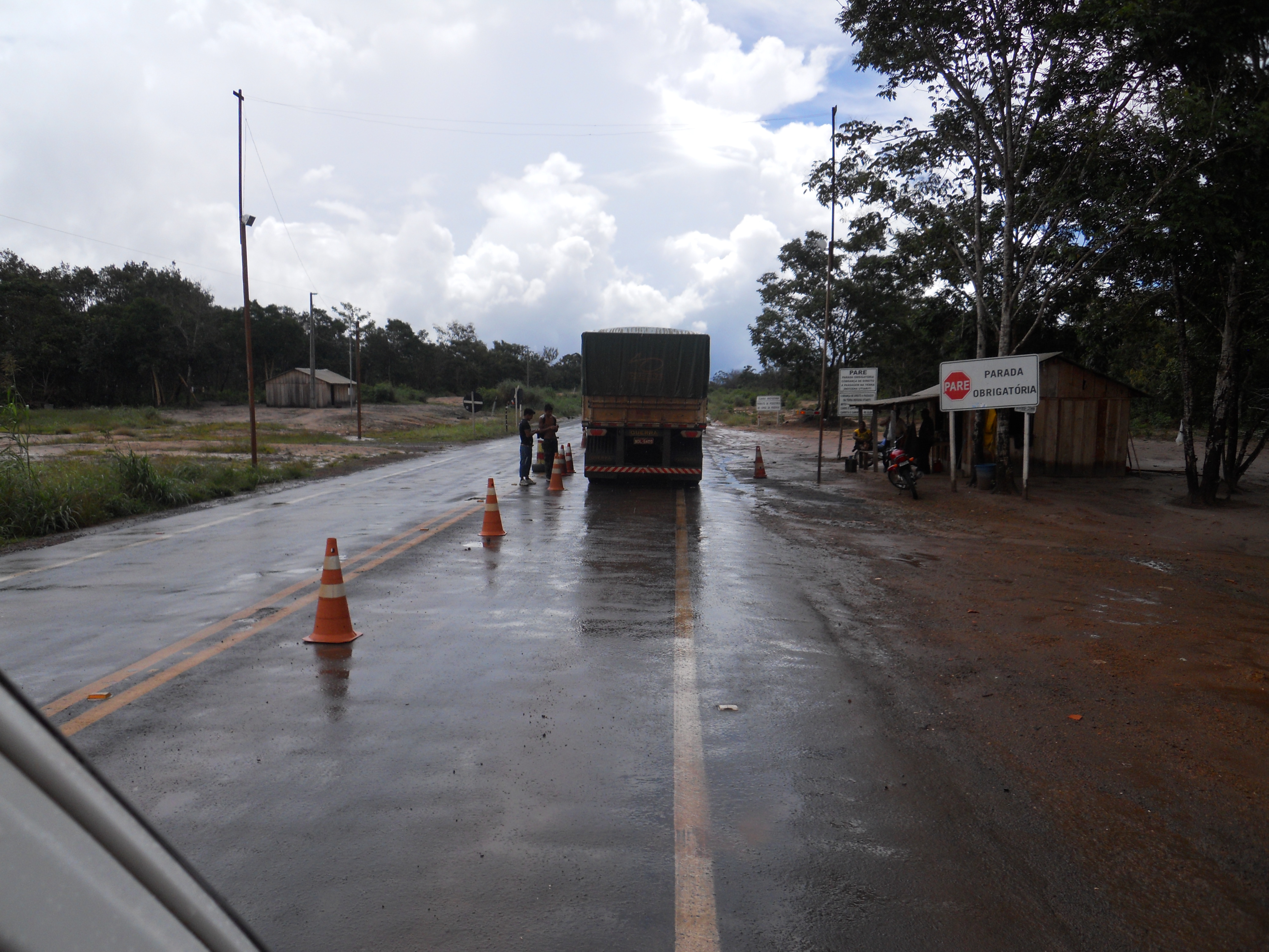 Waiting to pay toll (R$ 20.00) to cross indigenous reserve in western Mato Grosso, Brazil