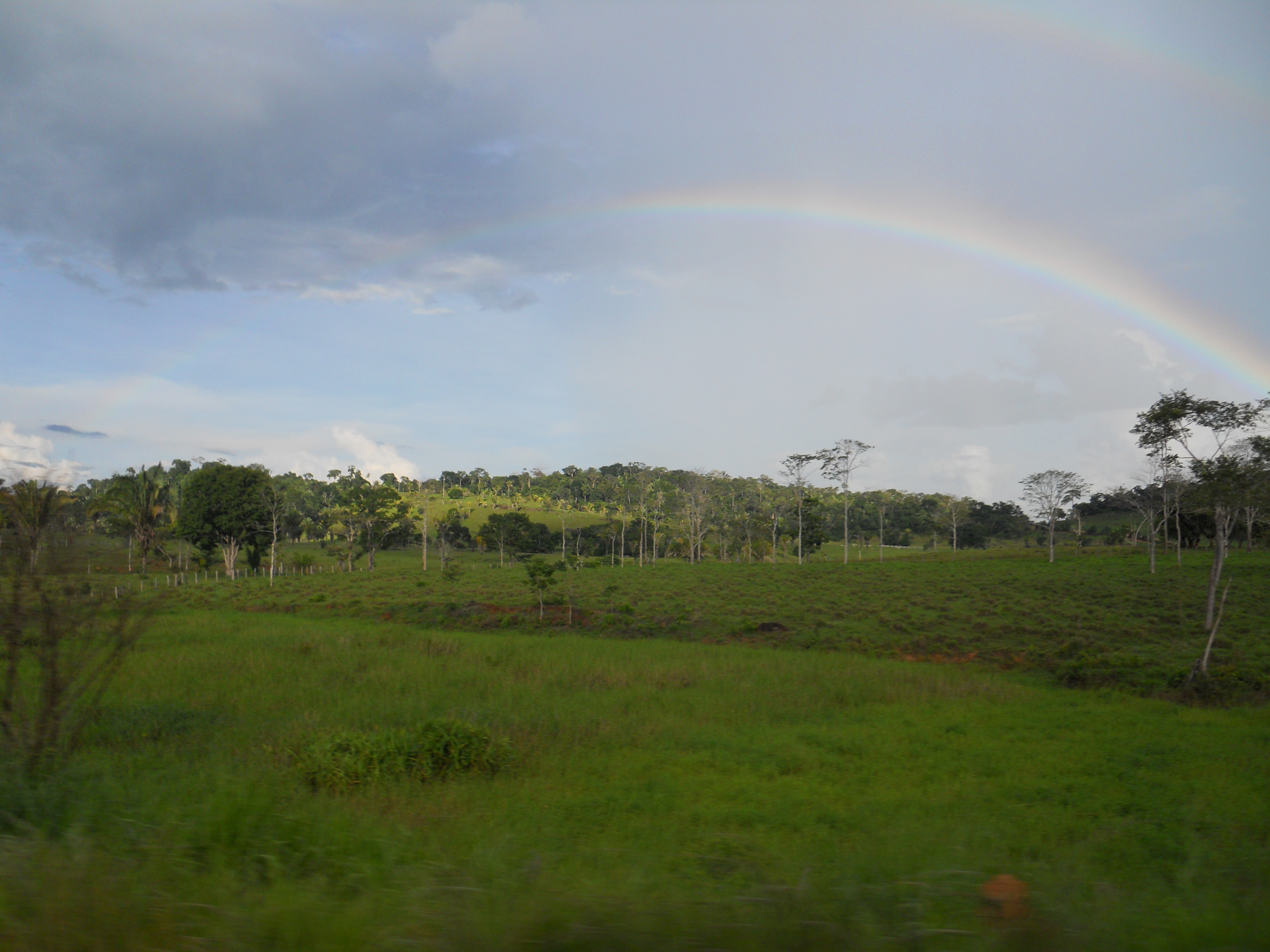 Rainbow over Amazon Rain Forest in central Rondonia, Brazil