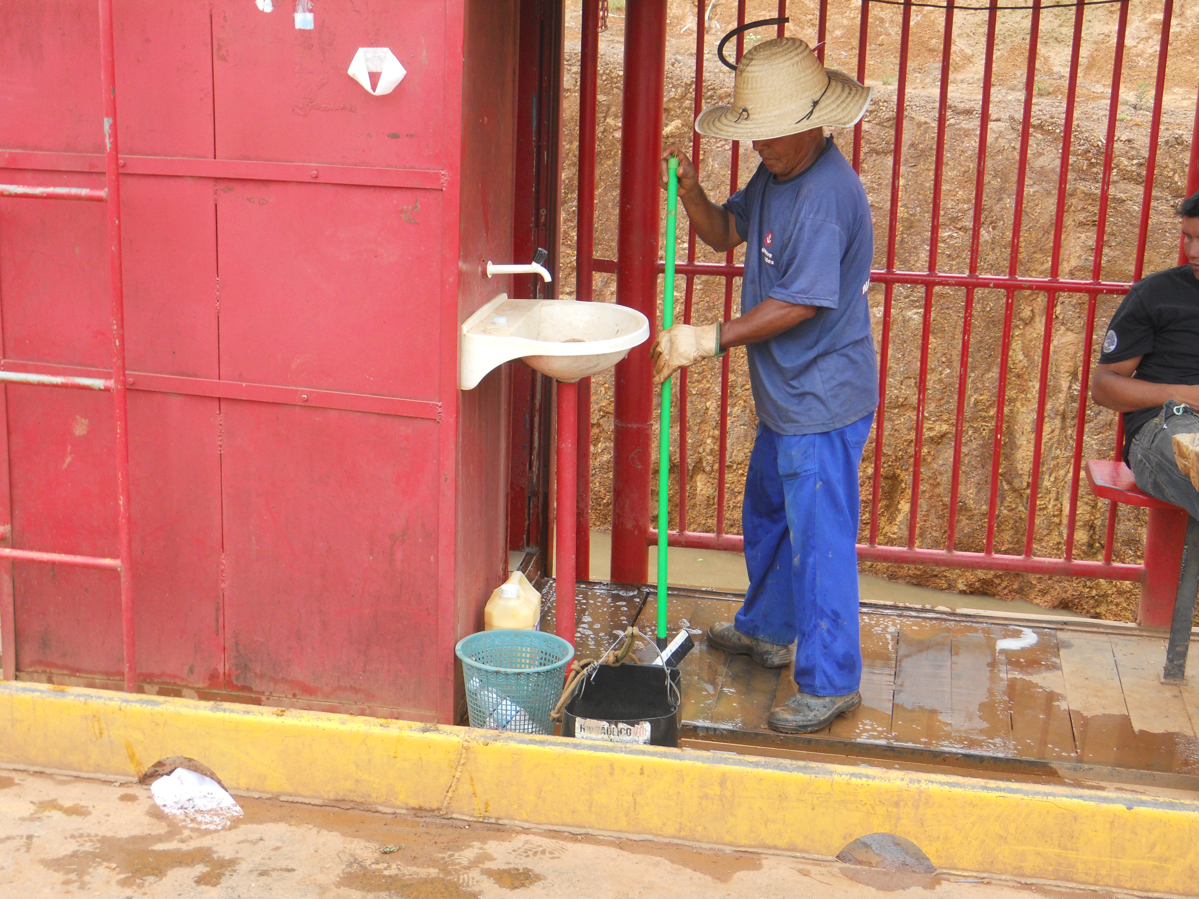 Cleaning up on the ferry boat crossing the Madeira River in northern Brazil